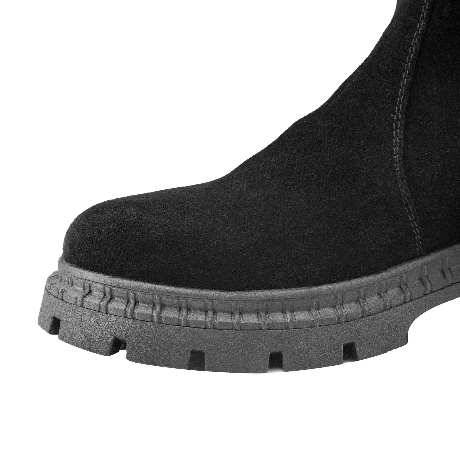 Крупний план текстури чорної замші та еластичної вставки на черевиках Shtayer Челсі